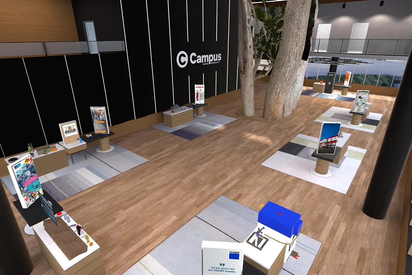 Virtual exhibition hall from above with exhibit tables, including a Trumpf station, and the Campus logo on the wall