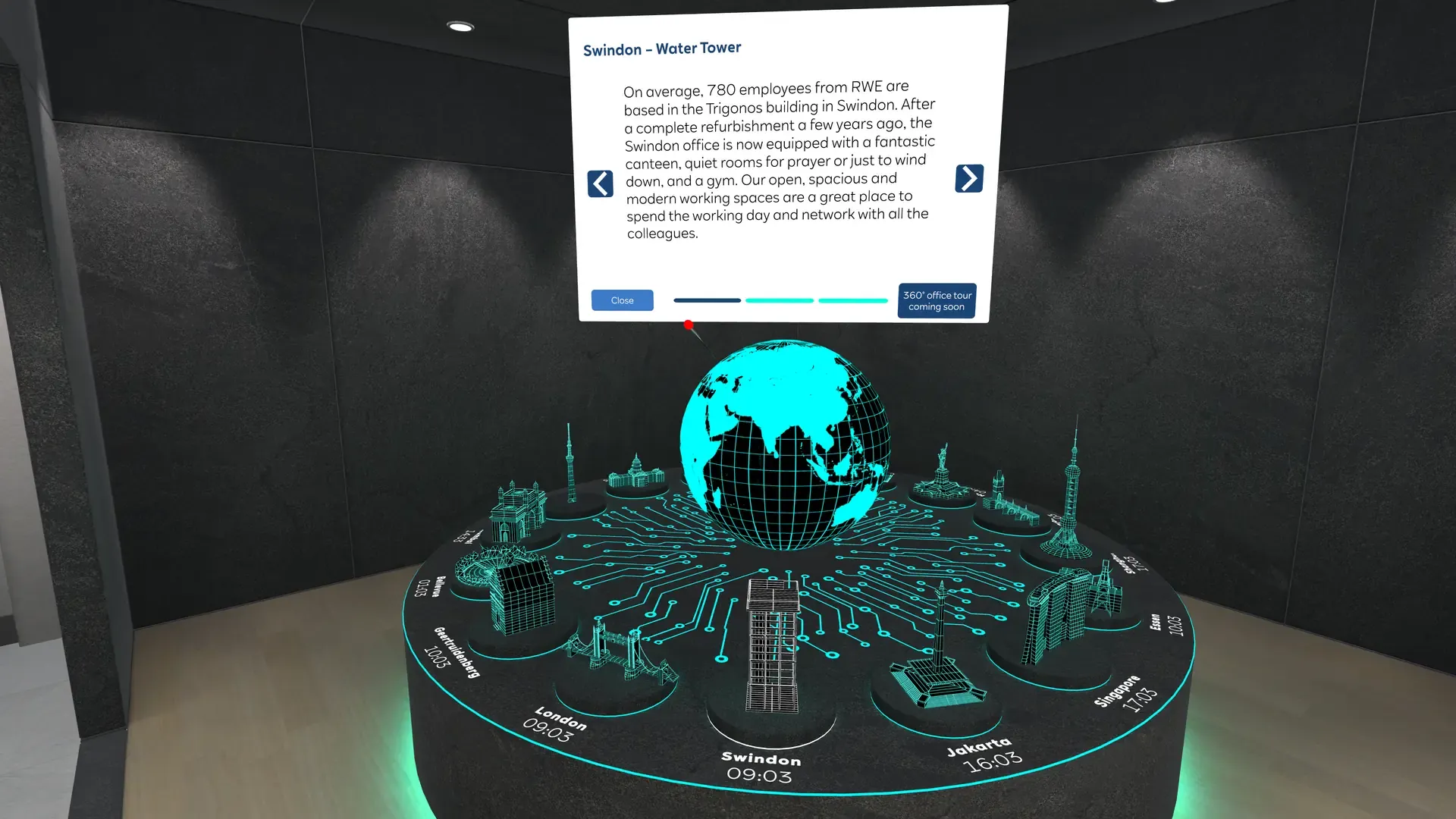 Globe model with landmarks of RWE's locations, with an information panel about the Swindon site above it